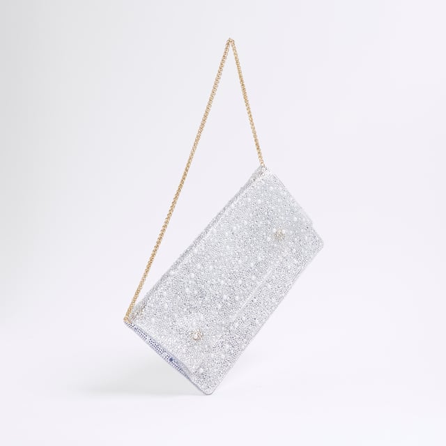 River Island Womens Clear Perspex Embellished Clutch Bag Perspex style, Chain shoulder strap, Popper fastening, Strap size: 22cm, Dimensions H: 14cm x W: 27.3cmAbout the brandFASHION IS OUR DNARiver Island is an icon of the British high street. Inspired by the latest trends and our heritage style archives, we've been serving style and leading trends for over sixty years.We make fashion for real people with real lives, who want to look real good. Because life's a celebration - let's dress for it.