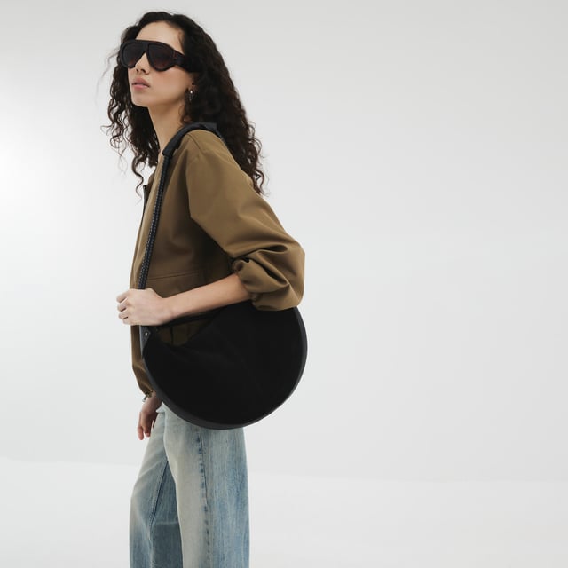 River Island Womens Black Suede Knot Handle Slouchy Shoulder Bag Suede, Shoulder strap, Knot detail, Interior zip pocket, Zip fastening, Handle drop: 31cm, H: 29cm x W: 42cm x D: 7cmAbout the brandFASHION IS OUR DNARiver Island is an icon of the British high street. Inspired by the latest trends and our heritage style archives, we've been serving style and leading trends for over sixty years.We make fashion for real people with real lives, who want to look real good. Because life's a celebration - let's dress for it.