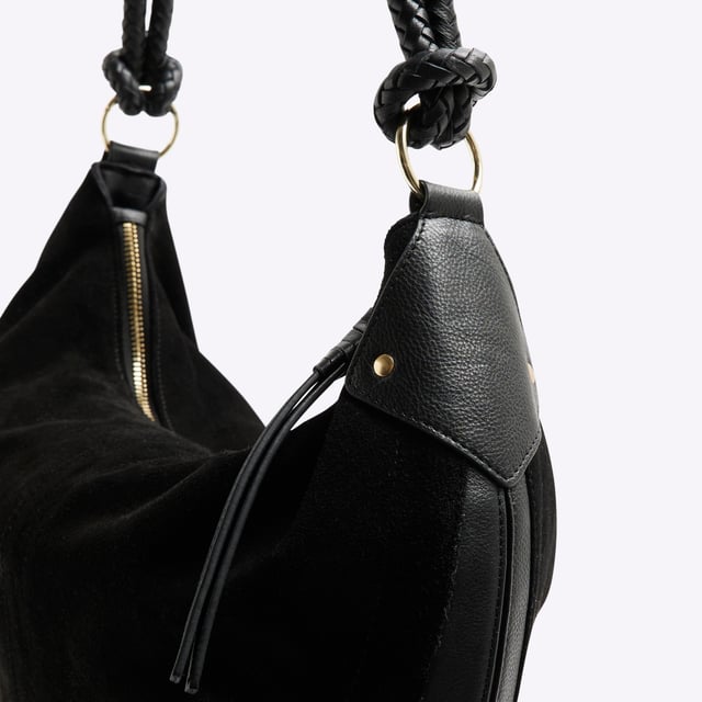 River Island Womens Black Suede Knot Handle Slouchy Shoulder Bag Suede, Shoulder strap, Knot detail, Interior zip pocket, Zip fastening, Handle drop: 31cm, H: 29cm x W: 42cm x D: 7cmAbout the brandFASHION IS OUR DNARiver Island is an icon of the British high street. Inspired by the latest trends and our heritage style archives, we've been serving style and leading trends for over sixty years.We make fashion for real people with real lives, who want to look real good. Because life's a celebration - let's dress for it.