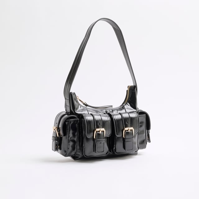 River Island Womens Black Buckle Pocket Utility Shoulder Bag Faux leather, Patent, Shoulder strap, Pocket detail, Gold hardware, Interior pocket, Zip fastening, Handle drop: 25cm, H: 15cm x W: 25cm x D: 8cmAbout the brandFASHION IS OUR DNARiver Island is an icon of the British high street. Inspired by the latest trends and our heritage style archives, we've been serving style and leading trends for over sixty years.We make fashion for real people with real lives, who want to look real good. Because life's a celebration - let's dress for it.