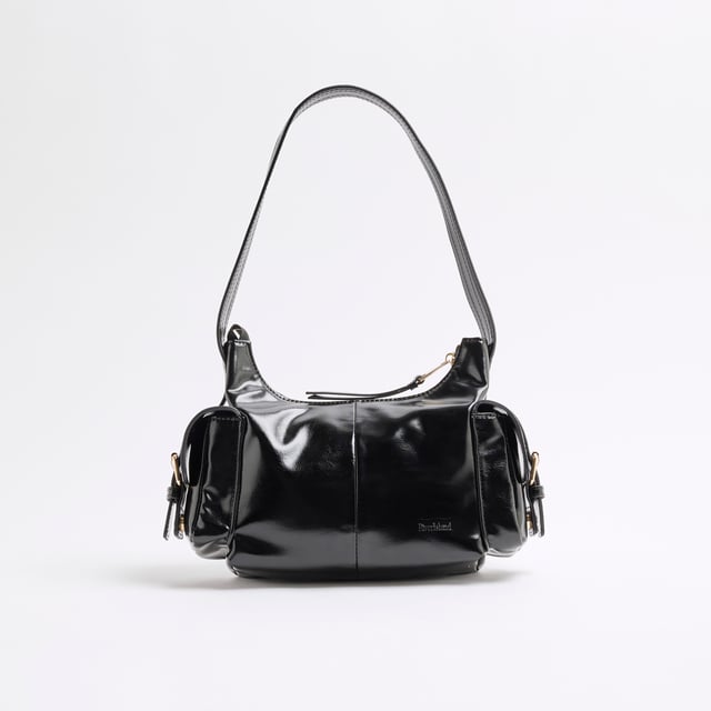 River Island Womens Black Buckle Pocket Utility Shoulder Bag Faux leather, Patent, Shoulder strap, Pocket detail, Gold hardware, Interior pocket, Zip fastening, Handle drop: 25cm, H: 15cm x W: 25cm x D: 8cmAbout the brandFASHION IS OUR DNARiver Island is an icon of the British high street. Inspired by the latest trends and our heritage style archives, we've been serving style and leading trends for over sixty years.We make fashion for real people with real lives, who want to look real good. Because life's a celebration - let's dress for it.