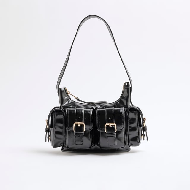 River Island Womens Black Buckle Pocket Utility Shoulder Bag Faux leather, Patent, Shoulder strap, Pocket detail, Gold hardware, Interior pocket, Zip fastening, Handle drop: 25cm, H: 15cm x W: 25cm x D: 8cmAbout the brandFASHION IS OUR DNARiver Island is an icon of the British high street. Inspired by the latest trends and our heritage style archives, we've been serving style and leading trends for over sixty years.We make fashion for real people with real lives, who want to look real good. Because life's a celebration - let's dress for it.
