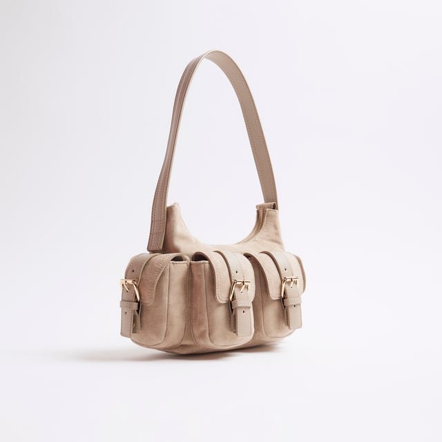 River Island Womens Beige Faux Suede Buckle Pocket Utility Bag Shoulder strap, Buckle pockets, Embossed branding, Zipped fastening, W 23cm x D 8cmAbout the brandFASHION IS OUR DNARiver Island is an icon of the British high street. Inspired by the latest trends and our heritage style archives, we've been serving style and leading trends for over sixty years.We make fashion for real people with real lives, who want to look real good. Because life's a celebration - let's dress for it.