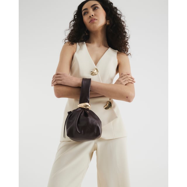 Faux leather, Grab handle, Gold detail, Zip fastening, Dimensions: L: 16cm x D: 14cm x W: 28cmAbout the brandFASHION IS OUR DNARiver Island is an icon of the British high street. Inspired by the latest trends and our heritage style archives, we've been serving style and leading trends for over sixty years.We make fashion for real people with real lives, who want to look real good. Because life's a celebration - let's dress for it.
