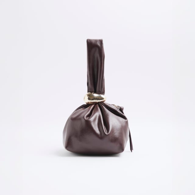 Faux leather, Grab handle, Gold detail, Zip fastening, Dimensions: L: 16cm x D: 14cm x W: 28cmAbout the brandFASHION IS OUR DNARiver Island is an icon of the British high street. Inspired by the latest trends and our heritage style archives, we've been serving style and leading trends for over sixty years.We make fashion for real people with real lives, who want to look real good. Because life's a celebration - let's dress for it.
