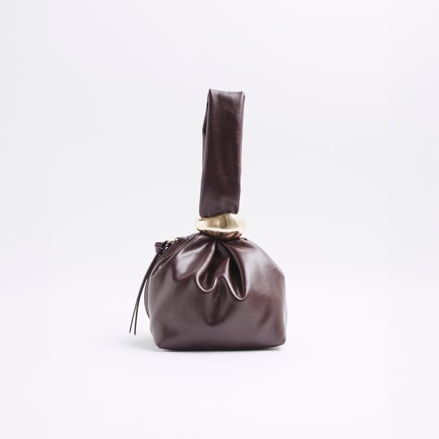 Faux leather, Grab handle, Gold detail, Zip fastening, Dimensions: L: 16cm x D: 14cm x W: 28cmAbout the brandFASHION IS OUR DNARiver Island is an icon of the British high street. Inspired by the latest trends and our heritage style archives, we've been serving style and leading trends for over sixty years.We make fashion for real people with real lives, who want to look real good. Because life's a celebration - let's dress for it.