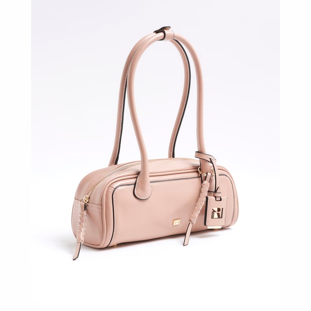 River Island Womens Pink Faux Leather Shoulder Bag Faux leather fabric, RI branding, Charm detail, Zipped fastening, Shoulder strapped, Strapped stud pressed fastening, Handle drop length: 23cm, Bag dimensions: H: 12cm x W: 30cm x D: 10.5cmAbout the brandFASHION IS OUR DNARiver Island is an icon of the British high street. Inspired by the latest trends and our heritage style archives, we've been serving style and leading trends for over sixty years.We make fashion for real people with real lives, who want to look real good. Because life's a celebration - let's dress for it.