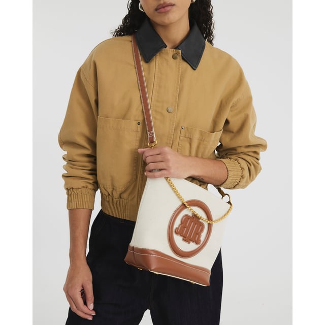 River Island Womens Cream Canvas Bucket Bag Canvas fabric, RR pendant, Lock detail, Stud pressed fastening, Grab handle, Bag dimension: H: 26cm x D: 12cm x W: 30cmAbout the brandFASHION IS OUR DNARiver Island is an icon of the British high street. Inspired by the latest trends and our heritage style archives, we've been serving style and leading trends for over sixty years.We make fashion for real people with real lives, who want to look real good. Because life's a celebration - let's dress for it.