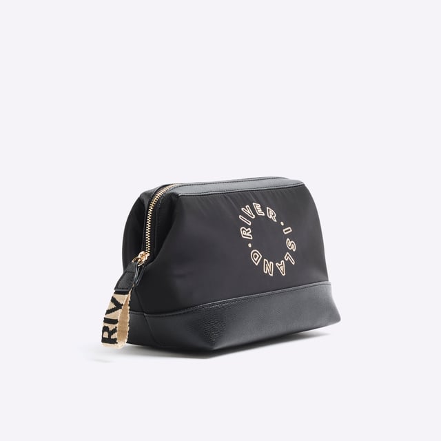 River Island Womens Black Ri Makeup Bag Embroidery RI graphic, Zipped fastening, Bag dimensions: L: 16cm x D: 14cm x W: 27cmAbout the brandFASHION IS OUR DNARiver Island is an icon of the British high street. Inspired by the latest trends and our heritage style archives, we've been serving style and leading trends for over sixty years.We make fashion for real people with real lives, who want to look real good. Because life's a celebration - let's dress for it.