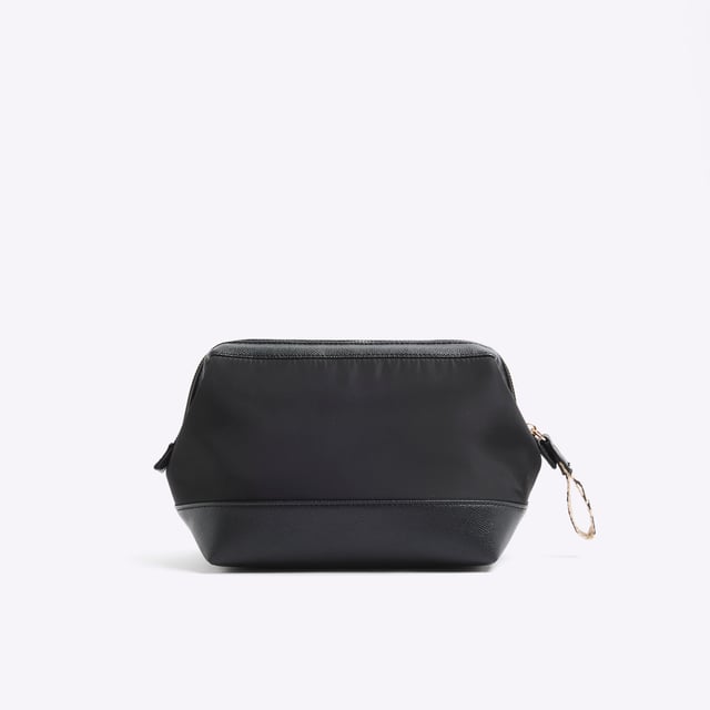 River Island Womens Black Ri Makeup Bag Embroidery RI graphic, Zipped fastening, Bag dimensions: L: 16cm x D: 14cm x W: 27cmAbout the brandFASHION IS OUR DNARiver Island is an icon of the British high street. Inspired by the latest trends and our heritage style archives, we've been serving style and leading trends for over sixty years.We make fashion for real people with real lives, who want to look real good. Because life's a celebration - let's dress for it.