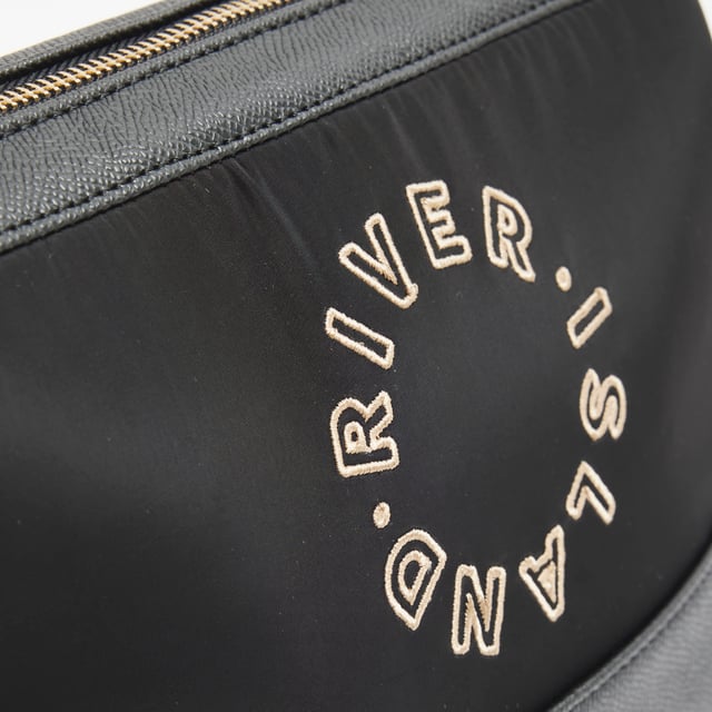 River Island Womens Black Ri Makeup Bag Embroidery RI graphic, Zipped fastening, Bag dimensions: L: 16cm x D: 14cm x W: 27cmAbout the brandFASHION IS OUR DNARiver Island is an icon of the British high street. Inspired by the latest trends and our heritage style archives, we've been serving style and leading trends for over sixty years.We make fashion for real people with real lives, who want to look real good. Because life's a celebration - let's dress for it.