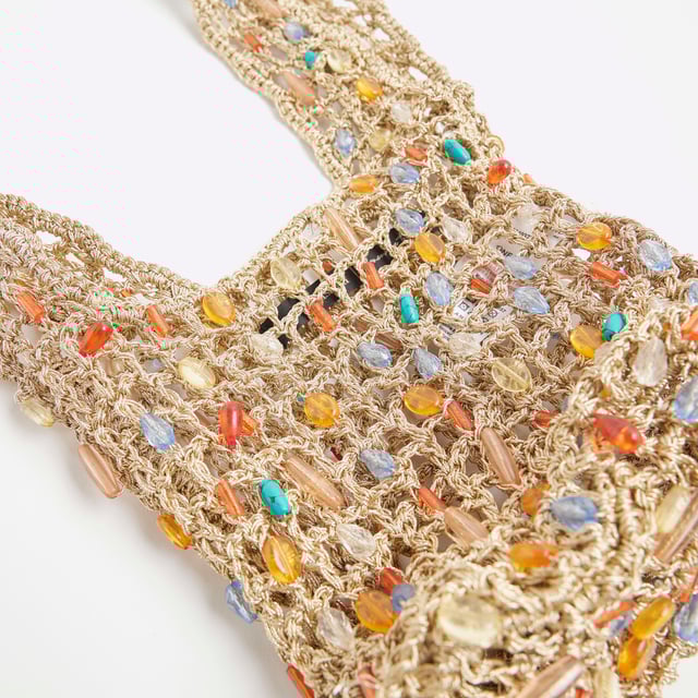 River Island Womens Beige Beaded Grab Bag Top handle, Beaded embellishment, Net design, H: 16cm x W: 18cm x D: 9cmAbout the brandFASHION IS OUR DNARiver Island is an icon of the British high street. Inspired by the latest trends and our heritage style archives, we've been serving style and leading trends for over sixty years.We make fashion for real people with real lives, who want to look real good. Because life's a celebration - let's dress for it.