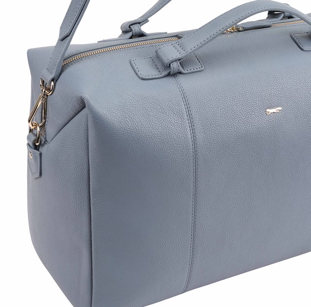 This Paul Costelloe ODELIA Weekend/Duffle Bag benefits from having top handles and an adjustable shoulder strap so you can wear it however you find most comfortable! Roomy enough for all your overnight essentials. It is sturdy yet light to carry. Perfect for long weekend stay or as a hospital bag for you and the new baby.  Designed with one large main compartment as well as a secure interior pockets, it can hold all your essentials with ease. D:21cm W:48cm H:26cm