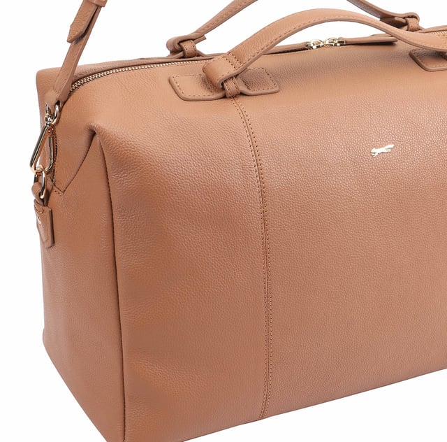 This Paul Costelloe ODELIA Weekend/Duffle Bag benefits from having top handles and an adjustable shoulder strap so you can wear it however you find most comfortable! Roomy enough for all your overnight essentials. It is sturdy yet light to carry. Perfect for long weekend stay or as a hospital bag for you and the new baby.  Designed with one large main compartment as well as a secure interior pockets, it can hold all your essentials with ease. D:21cm W:48cm H:26cm