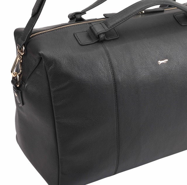 This Paul Costelloe ODELIA Weekend/Duffle Bag benefits from having top handles and an adjustable shoulder strap so you can wear it however you find most comfortable! Roomy enough for all your overnight essentials. It is sturdy yet light to carry. Perfect for long weekend stay or as a hospital bag for you and the new baby.  Designed with one large main compartment as well as a secure interior pockets, it can hold all your essentials with ease. D:21cm W:48cm H:26cm
