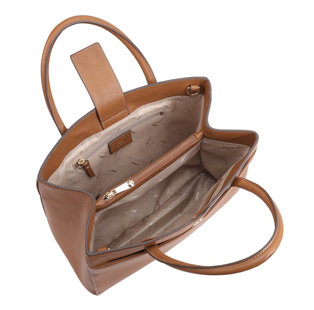 Made from soft premium leather, MAHAVY is a stylish work/travel bag is designed for both function and flair. It features two main compartments with a central zip section, all secured by a sleek magnetic tab. Inside, zipped and slip pockets on either side offer organized storageyou're your smaller essentials like keys, coin and phone. Complete with a removable, adjustable shoulder strap, it's a versatile and trendy companion for everyday use or travel. D:14.3cm W:33cm H:23.5cm