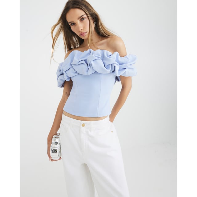 River Island Womens Bardot Top Blue Ruffle Scuba fabric, Bardot neckline, Sleeveless, Ruffle detailAbout the brandFASHION IS OUR DNARiver Island is an icon of the British high street. Inspired by the latest trends and our heritage style archives, we've been serving style and leading trends for over sixty years.We make fashion for real people with real lives, who want to look real good. Because life's a celebration - let's dress for it.