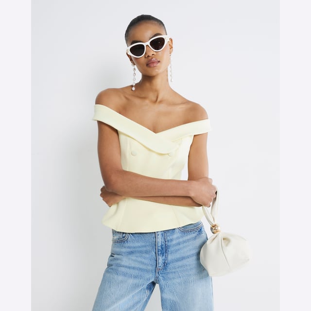 Bardot neckline, Sleeveless, Button detailAbout the brandFASHION IS OUR DNARiver Island is an icon of the British high street. Inspired by the latest trends and our heritage style archives, we've been serving style and leading trends for over sixty years.We make fashion for real people with real lives, who want to look real good. Because life's a celebration - let's dress for it.
