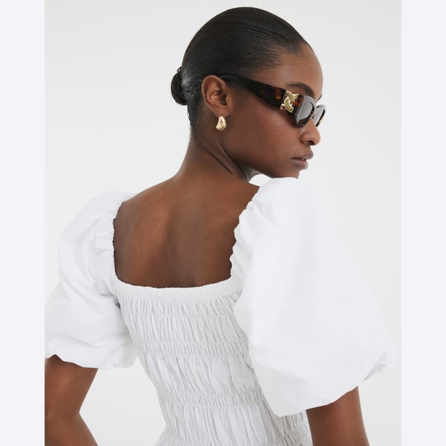 Square neckline, Puff sleeves, Shirred detailAbout the brandFASHION IS OUR DNARiver Island is an icon of the British high street. Inspired by the latest trends and our heritage style archives, we've been serving style and leading trends for over sixty years.We make fashion for real people with real lives, who want to look real good. Because life's a celebration - let's dress for it.