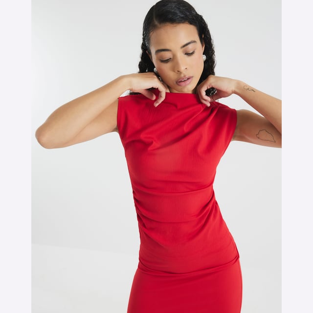 High neck, Short sleeves, Drape detailAbout the brandFASHION IS OUR DNARiver Island is an icon of the British high street. Inspired by the latest trends and our heritage style archives, we've been serving style and leading trends for over sixty years.We make fashion for real people with real lives, who want to look real good. Because life's a celebration - let's dress for it.