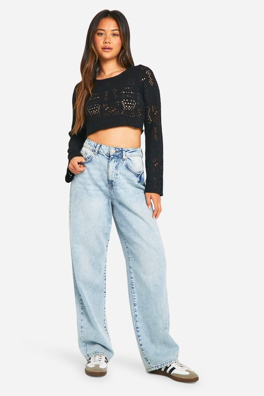 Intricate crochet-style pattern for a bold, eye-catching look
        Cropped length perfect for showcasing high-waisted bottoms
        Long sleeves with a slightly flared design
        Textured fabric adds depth and interest to the garment
        Versatile piece suitable for layering or wearing on its own
    
    This long-sleeved textured top is a must-have addition to your casual wardrobe. The intricate crochet-style pattern creates a captivating visual appeal, while the cropped silhouette adds a contemporary edge. Style it with high-waisted jeans and trainers for a laid-back daytime look, or pair it with a midi skirt and ankle boots for a chic evening ensemble. The versatility of this top makes it perfect for various casual occasions, from coffee dates to family gatherings. Layer it over a camisole on cooler days or wear it solo when the temperature rises. The slightly flared sleeves provide a subtle bohemian touch, making this top a standout piece that effortlessly combines comfort and style.