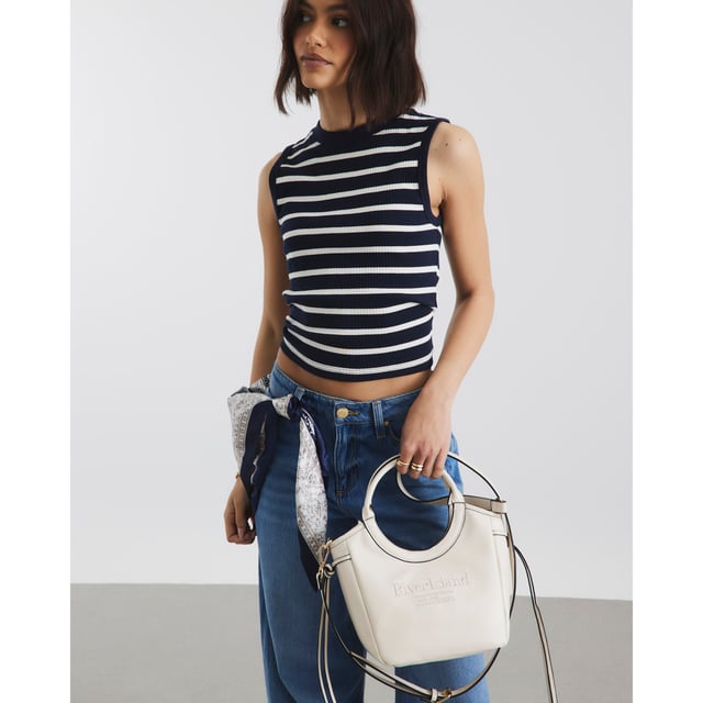 Faux leather fabric, Embossed branding, Side tie detail, Rounded handle, Popper fastening, Adjustable strap, Handle drop: 60cm, Bag dimensions: L: 20cm x D: 14cm x W: 22cmAbout the brandFASHION IS OUR DNARiver Island is an icon of the British high street. Inspired by the latest trends and our heritage style archives, we've been serving style and leading trends for over sixty years.We make fashion for real people with real lives, who want to look real good. Because life's a celebration - let's dress for it.