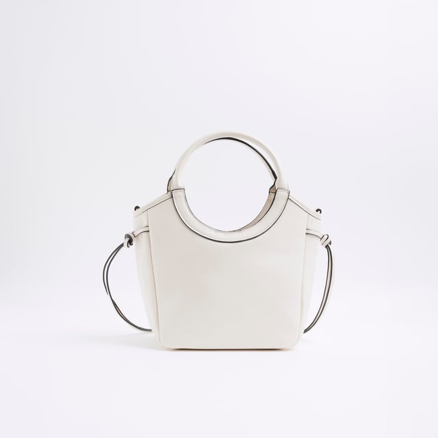 Faux leather fabric, Embossed branding, Side tie detail, Rounded handle, Popper fastening, Adjustable strap, Handle drop: 60cm, Bag dimensions: L: 20cm x D: 14cm x W: 22cmAbout the brandFASHION IS OUR DNARiver Island is an icon of the British high street. Inspired by the latest trends and our heritage style archives, we've been serving style and leading trends for over sixty years.We make fashion for real people with real lives, who want to look real good. Because life's a celebration - let's dress for it.