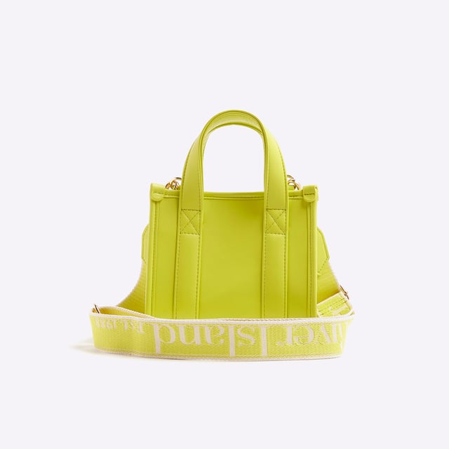 River Island Womens Lime Mini Embossed Tote Bag Faux leather, Grab top handles, Embossed branding, Detachable branded cross body strap, Popper fastening, W 18cm x D 9cmAbout the brandFASHION IS OUR DNARiver Island is an icon of the British high street. Inspired by the latest trends and our heritage style archives, we've been serving style and leading trends for over sixty years.We make fashion for real people with real lives, who want to look real good. Because life's a celebration - let's dress for it.