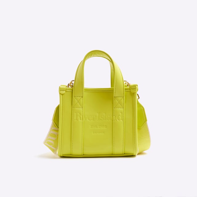 River Island Womens Lime Mini Embossed Tote Bag Faux leather, Grab top handles, Embossed branding, Detachable branded cross body strap, Popper fastening, W 18cm x D 9cmAbout the brandFASHION IS OUR DNARiver Island is an icon of the British high street. Inspired by the latest trends and our heritage style archives, we've been serving style and leading trends for over sixty years.We make fashion for real people with real lives, who want to look real good. Because life's a celebration - let's dress for it.
