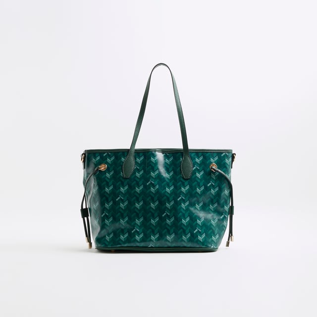 River Island Womens Green Geometric Side Tie Shopper Bag Embossed geometric print, Side tied, Charm pendants, Detachable pouch, Gold metal RI branding, Shoulder handle, Adjustable strap, Handle drop: 23cm x Strap drop: 65cm, Bag dimensions: L: 25cm x D: 18cm x W: 50cmAbout the brandFASHION IS OUR DNARiver Island is an icon of the British high street. Inspired by the latest trends and our heritage style archives, we've been serving style and leading trends for over sixty years.We make fashion for real people with real lives, who want to look real good. Because life's a celebration - let's dress for it.