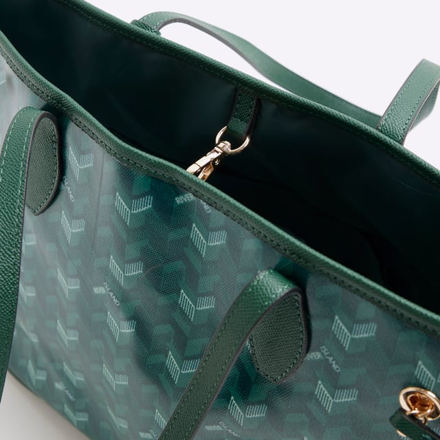 River Island Womens Green Geometric Side Tie Shopper Bag Embossed geometric print, Side tied, Charm pendants, Detachable pouch, Gold metal RI branding, Shoulder handle, Adjustable strap, Handle drop: 23cm x Strap drop: 65cm, Bag dimensions: L: 25cm x D: 18cm x W: 50cmAbout the brandFASHION IS OUR DNARiver Island is an icon of the British high street. Inspired by the latest trends and our heritage style archives, we've been serving style and leading trends for over sixty years.We make fashion for real people with real lives, who want to look real good. Because life's a celebration - let's dress for it.