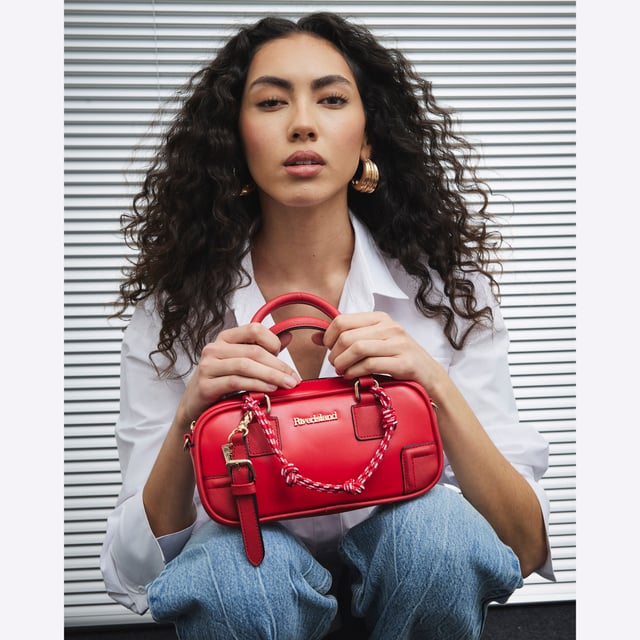 River Island Womens Red Faux Leather Charm Top Handle Bowler Bag Faux leather fabric, Adjustable strap, Grab handle, Zip fastening, Charm detail, Handle strap: 11cm x Strap drop: 60cm, Dimensions: H: 11cm x D: 7.5cm x W: 22.5cmAbout the brandFASHION IS OUR DNARiver Island is an icon of the British high street. Inspired by the latest trends and our heritage style archives, we've been serving style and leading trends for over sixty years.We make fashion for real people with real lives, who want to look real good. Because life's a celebration - let's dress for it.