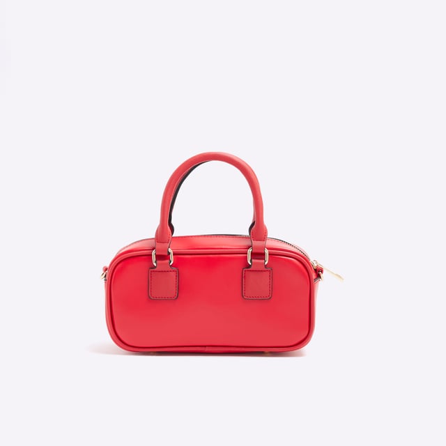 River Island Womens Red Faux Leather Charm Top Handle Bowler Bag Faux leather fabric, Adjustable strap, Grab handle, Zip fastening, Charm detail, Handle strap: 11cm x Strap drop: 60cm, Dimensions: H: 11cm x D: 7.5cm x W: 22.5cmAbout the brandFASHION IS OUR DNARiver Island is an icon of the British high street. Inspired by the latest trends and our heritage style archives, we've been serving style and leading trends for over sixty years.We make fashion for real people with real lives, who want to look real good. Because life's a celebration - let's dress for it.
