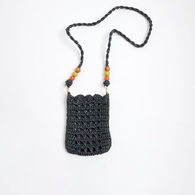 River Island Womens Black Raffia Beaded Cross Body Phone Bag Raffia, Cross body strap, Beaded detail, Strap drop: 50cm, Bag dimensions: H: 18cm x W: 13cm x D: 2cmAbout the brandFASHION IS OUR DNARiver Island is an icon of the British high street. Inspired by the latest trends and our heritage style archives, we've been serving style and leading trends for over sixty years.We make fashion for real people with real lives, who want to look real good. Because life's a celebration - let's dress for it.
