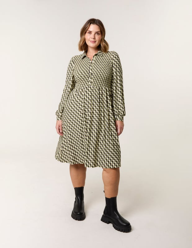 Gorgeous in geometric! A trendy shirt dress that will be sure to take you from desk to dinner stress free this summer.