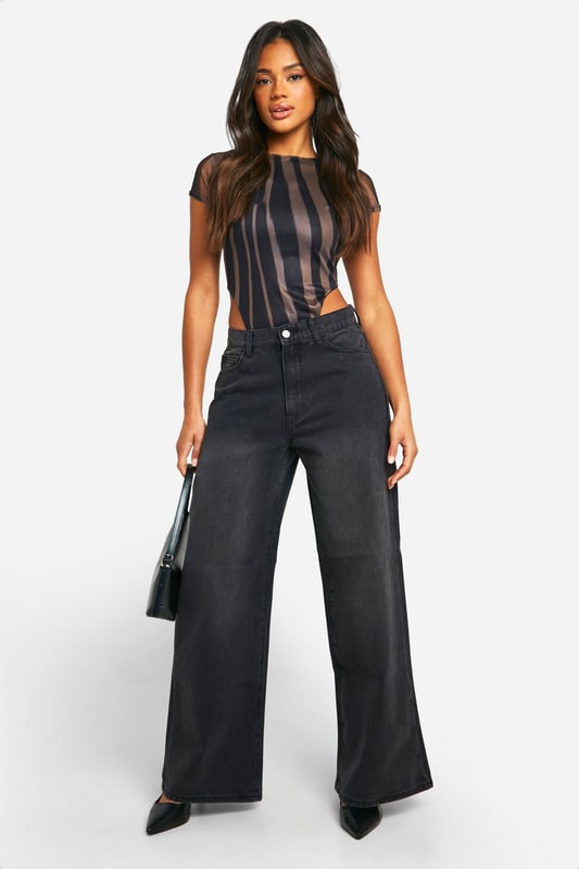 Striking vertical stripe pattern for a bold, eye-catching look
        Sheer mesh fabric adds a touch of allure and intrigue
        Daring cut-out back design for a sultry reveal
        Form-fitting silhouette accentuates curves
        Versatile bodysuit style for effortless pairing
    
    Make a statement on your next night out with this captivating cut-out back bodysuit from Boohoo. The vertical stripe pattern creates a visually elongating effect, while the sheer mesh fabric adds a tantalising touch of transparency. Perfect for the fashion-forward woman who loves to turn heads, this bodysuit can be styled multiple ways for various evening looks. Pair it with high-waisted wide-leg trousers and strappy heels for a chic club ensemble, or team it with a sleek midi skirt and statement earrings for cocktails with the girls. The versatile design allows for easy transition from day to night, making it an essential piece for the social butterfly who's always ready for her next adventure. Whether you're dancing the night away or enjoying drinks at a trendy rooftop bar, this bodysuit will ensure you're at the forefront of urban nightlife fashion.