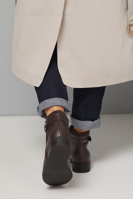 Good For The Sole: Wide Fit Mia Mixed Material Low Heel Ankle Boots Wide fit design ensures exceptional comfort for all-day wear
Decorative side buckle detail adds a subtle touch of sophistication
Mixed material construction combines different textures for visual interest
Flat heel measuring between 0-2cm provides stable support
Side zip closure allows for easy on-and-off access
The Mia Ankle Boots from Good For the Sole blend practicality with understated style. These versatile boots feature a clean silhouette with a distinctive side buckle that adds character without overwhelming the design. The wide fit construction ensures comfort for those who need a bit more room, whilst the flat heel provides stability for everyday activities. Style these faux leather boots with slim-fit trousers and an oversized jumper for casual weekend outings, or pair with tights and a midi skirt for a more polished daytime look. Perfect for autumn strolls, family gatherings or casual coffee dates, these boots will quickly become your go-to footwear choice. Their neutral aesthetic makes them incredibly adaptable to various outfits, whilst the durable construction ensures they'll withstand the demands of daily wear throughout the changing seasons.