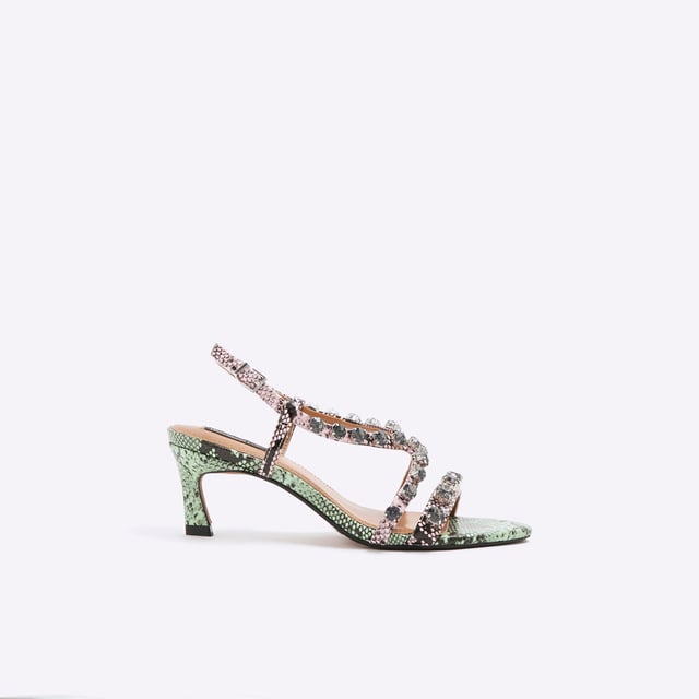 Faux leather fabric, Snake Print, Gem stone detail, Ankle strapped, Backless, Open toe, Skinny heel, Heel height: 5cmAbout the brandFASHION IS OUR DNARiver Island is an icon of the British high street. Inspired by the latest trends and our heritage style archives, we've been serving style and leading trends for over sixty years.We make fashion for real people with real lives, who want to look real good. Because life's a celebration - let's dress for it.