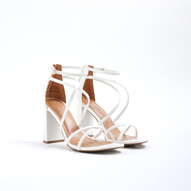 River Island Womens Sandals White Strappy Block Heel Block heel, Round open toe, Strappy style, Buckle fastening, Zip detail, Heel height: 6cmAbout the brandFASHION IS OUR DNARiver Island is an icon of the British high street. Inspired by the latest trends and our heritage style archives, we've been serving style and leading trends for over sixty years.We make fashion for real people with real lives, who want to look real good. Because life's a celebration - let's dress for it.