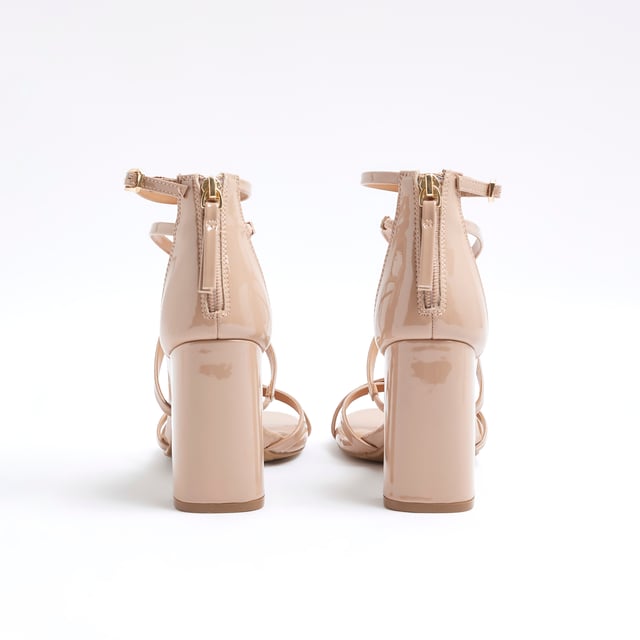 Patent fabric, Strappy detail, Zipped fastening, Open toe, Block heeled, Heel height: 6cmAbout the brandFASHION IS OUR DNARiver Island is an icon of the British high street. Inspired by the latest trends and our heritage style archives, we've been serving style and leading trends for over sixty years.We make fashion for real people with real lives, who want to look real good. Because life's a celebration - let's dress for it.