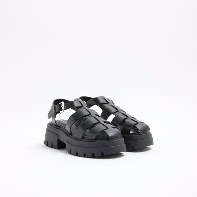 Faux leather fabric, Chunky detail, Cross strapped, Ankle strapped, Backless, Flat solesAbout the brandFASHION IS OUR DNARiver Island is an icon of the British high street. Inspired by the latest trends and our heritage style archives, we've been serving style and leading trends for over sixty years.We make fashion for real people with real lives, who want to look real good. Because life's a celebration - let's dress for it.