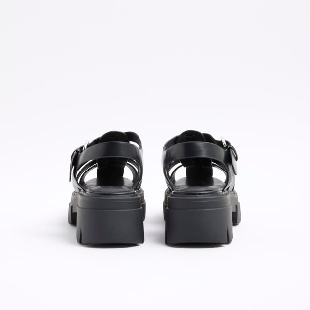 Faux leather fabric, Chunky detail, Cross strapped, Ankle strapped, Backless, Flat solesAbout the brandFASHION IS OUR DNARiver Island is an icon of the British high street. Inspired by the latest trends and our heritage style archives, we've been serving style and leading trends for over sixty years.We make fashion for real people with real lives, who want to look real good. Because life's a celebration - let's dress for it.