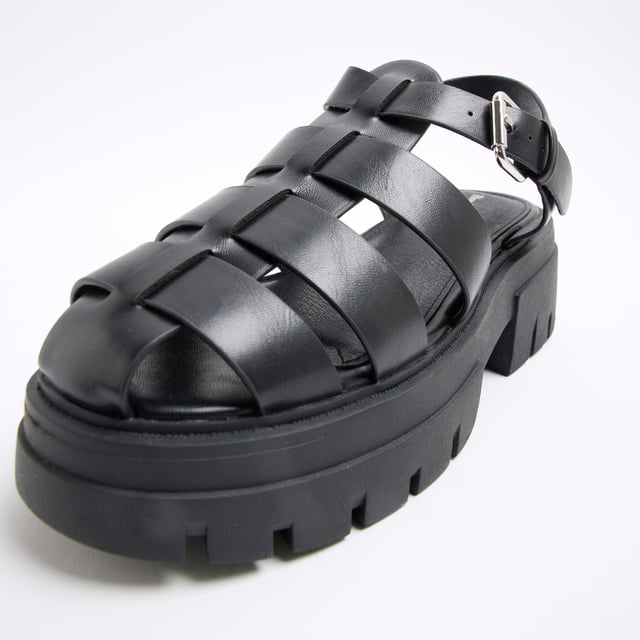 Faux leather fabric, Chunky detail, Cross strapped, Ankle strapped, Backless, Flat solesAbout the brandFASHION IS OUR DNARiver Island is an icon of the British high street. Inspired by the latest trends and our heritage style archives, we've been serving style and leading trends for over sixty years.We make fashion for real people with real lives, who want to look real good. Because life's a celebration - let's dress for it.