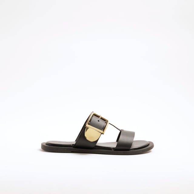 Leather fabric, T-Bar styled, Buckle strapped, Open toe, Backless, Flat solesAbout the brandFASHION IS OUR DNARiver Island is an icon of the British high street. Inspired by the latest trends and our heritage style archives, we've been serving style and leading trends for over sixty years.We make fashion for real people with real lives, who want to look real good. Because life's a celebration - let's dress for it.