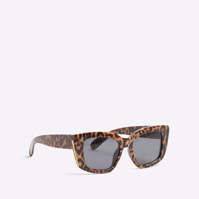 River Island Womens Beige Leopard Mid Size Chain Metal Sunglasses Leopard print, Metal framed, Mid size chain, Cat eye shaped, Tinted lensesAbout the brandFASHION IS OUR DNARiver Island is an icon of the British high street. Inspired by the latest trends and our heritage style archives, we've been serving style and leading trends for over sixty years.We make fashion for real people with real lives, who want to look real good. Because life's a celebration - let's dress for it.