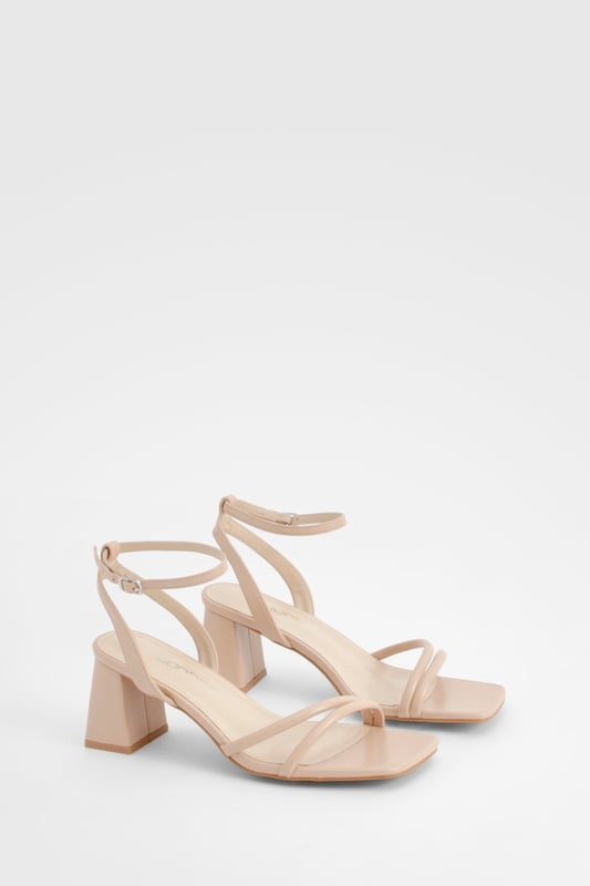 Look cute and feel comfy in these wide fit heels that will last you from boozy brunch all the way to bedtime, without the sore feet. They're designed to provide more room for the foot, and they have a wider tread on the sole, so they'll be super comfortable for you to make moves and serve looks, no matter what the occasion. You can wave goodbye to sore feet and say hello to a great night out. We're loving gold wide fit heels this party season teamed with a simple black midi - beaut.Style: 2 Part HeelsFabric: PU