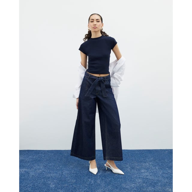 River Island Womens Cropped Jeans Indigo Belted Wide Leg Denim fabric, Cropped, Wide leg, Belted, Belt loops, Side slip pockets, Button and zipped fasteningAbout the brandFASHION IS OUR DNARiver Island is an icon of the British high street. Inspired by the latest trends and our heritage style archives, we've been serving style and leading trends for over sixty years.We make fashion for real people with real lives, who want to look real good. Because life's a celebration - let's dress for it.