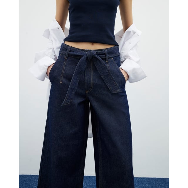 River Island Womens Cropped Jeans Indigo Belted Wide Leg Denim fabric, Cropped, Wide leg, Belted, Belt loops, Side slip pockets, Button and zipped fasteningAbout the brandFASHION IS OUR DNARiver Island is an icon of the British high street. Inspired by the latest trends and our heritage style archives, we've been serving style and leading trends for over sixty years.We make fashion for real people with real lives, who want to look real good. Because life's a celebration - let's dress for it.