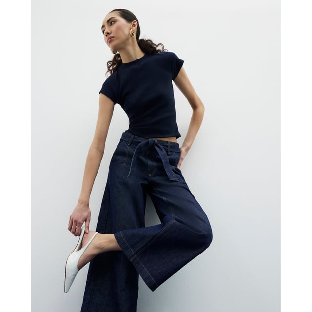 River Island Womens Cropped Jeans Indigo Belted Wide Leg Denim fabric, Cropped, Wide leg, Belted, Belt loops, Side slip pockets, Button and zipped fasteningAbout the brandFASHION IS OUR DNARiver Island is an icon of the British high street. Inspired by the latest trends and our heritage style archives, we've been serving style and leading trends for over sixty years.We make fashion for real people with real lives, who want to look real good. Because life's a celebration - let's dress for it.