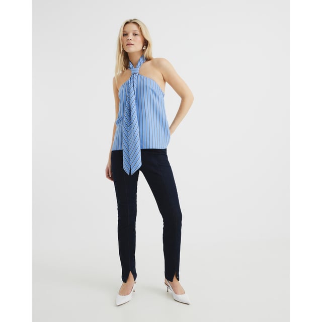Denim fabric, High rise, Slim fit, Ankle grazer length, Decorative pockets, Split hem detail, Concealed fasteningAbout the brandFASHION IS OUR DNARiver Island is an icon of the British high street. Inspired by the latest trends and our heritage style archives, we've been serving style and leading trends for over sixty years.We make fashion for real people with real lives, who want to look real good. Because life's a celebration - let's dress for it.